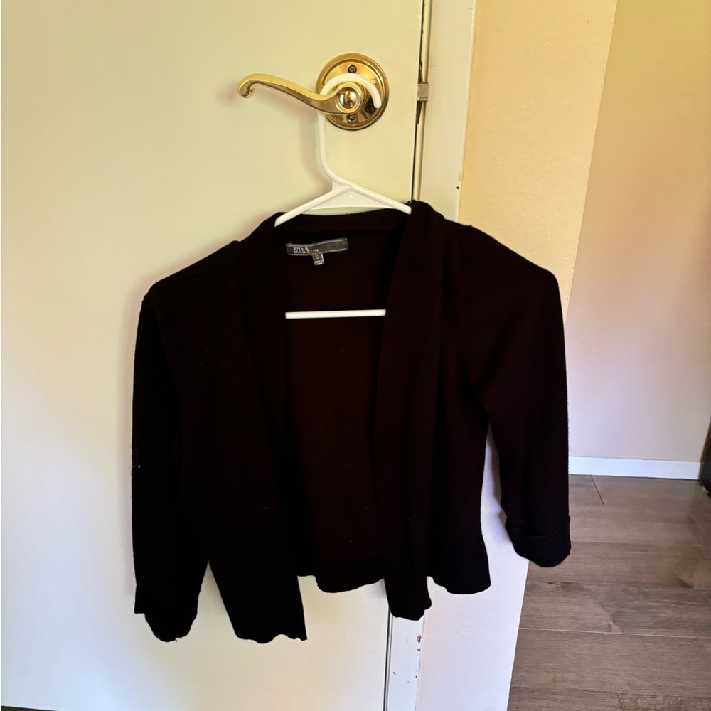 Black sweater perfect for formal and semi-casual wear. Great fit for tweens.